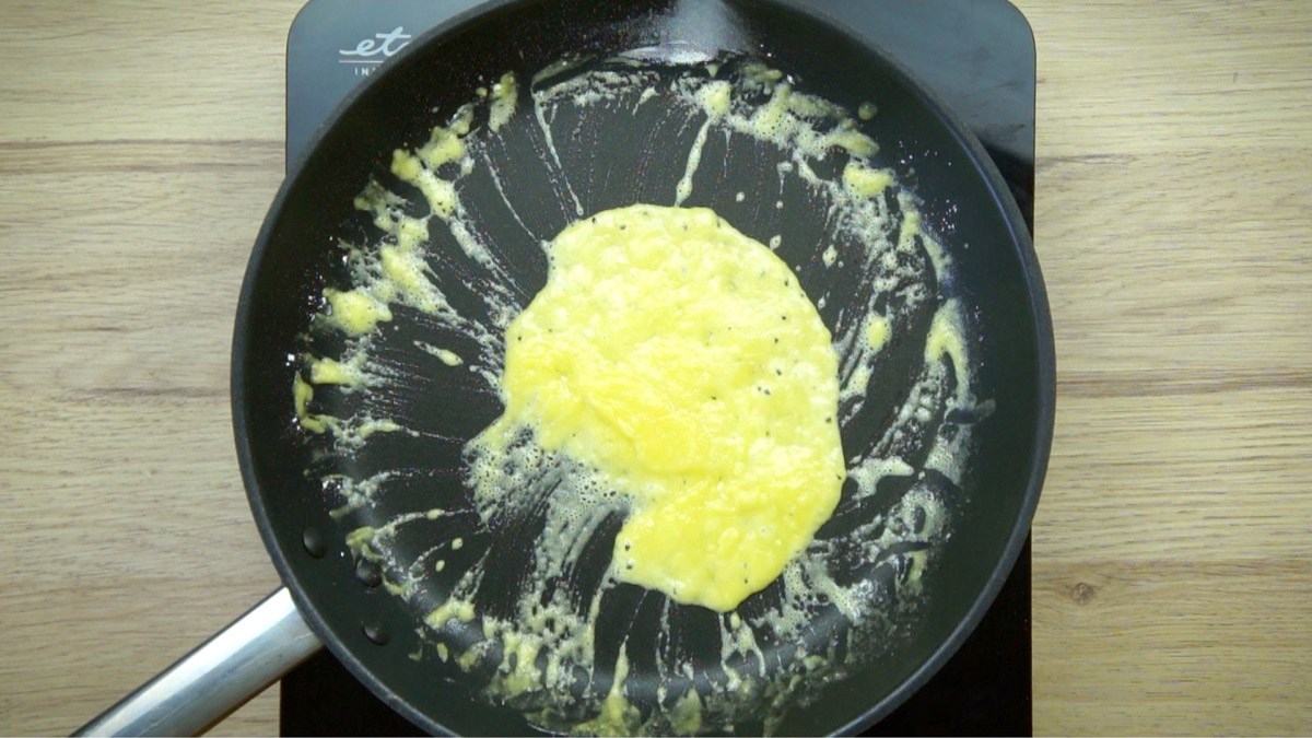 Frying pan with thick melted butter in the middle.