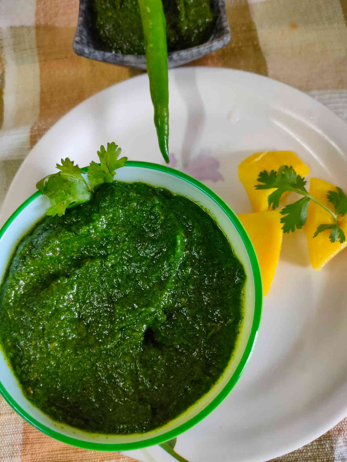 bowl of sumac dressing with whisk.