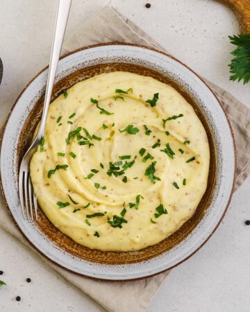 Yellow mashed potatoes on a plate