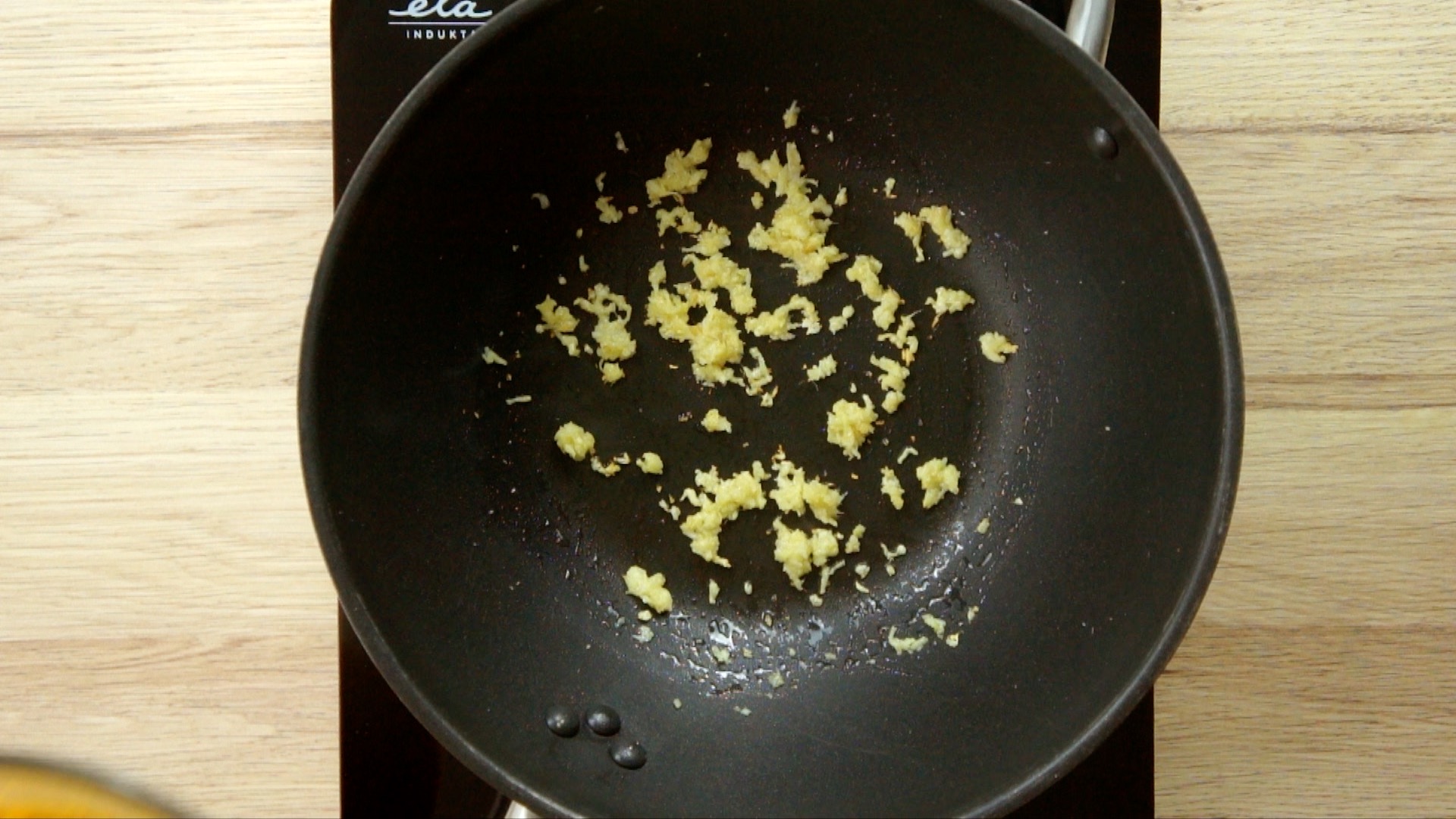 Minced garlic in a wok