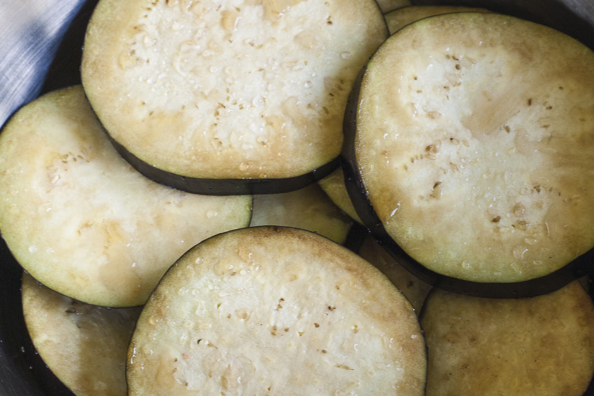 Eggplant slices in a bowl