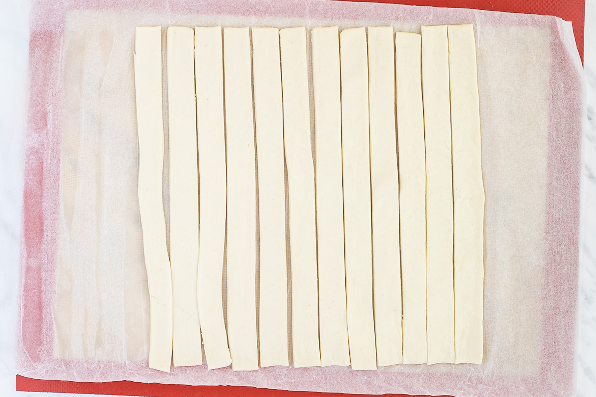 Puff pastry cut in stripes.