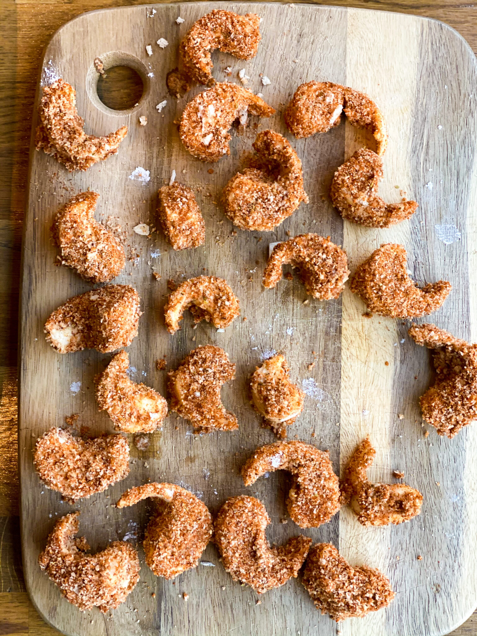 Shrimp shaped pieces in brown breadcrumbs