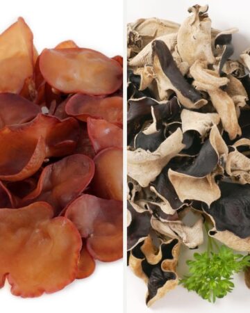 Fresh wood ear mushrooms on a white surface on the left side and brown dried ones on the right side.